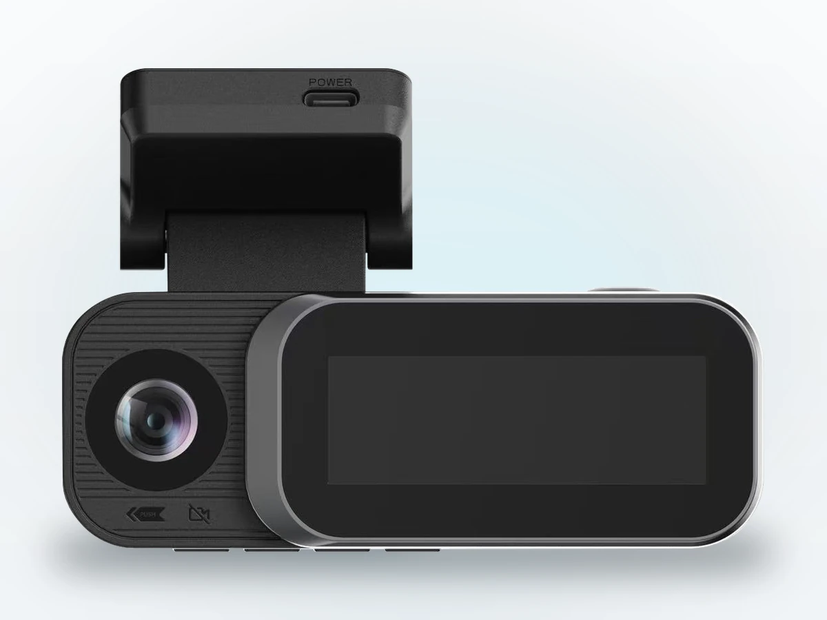 The cabin-facing side of the H2: the cabin lens on the left, the sliding display beside it, and the push-to-cover markings underneath